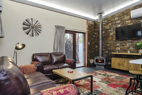 Luxury Room | Living area | 43-inch TV with digital channels, Netflix, DVD player