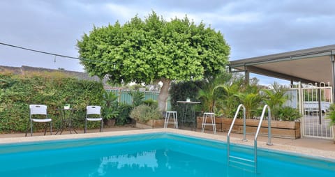 Outdoor pool, open 10:00 AM to 9:00 PM, sun loungers