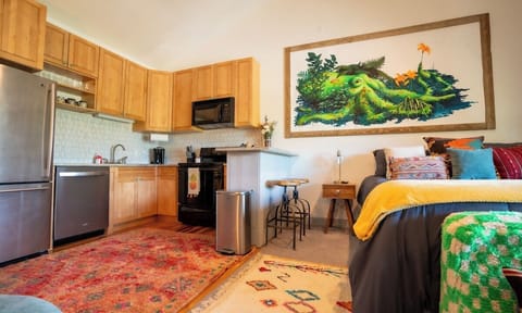 Our 8 foot original Octopus by Jesse Link dominates the space. If you like Art, this is your spot in Park City ;). Full kitchen here too with full sized appliances.