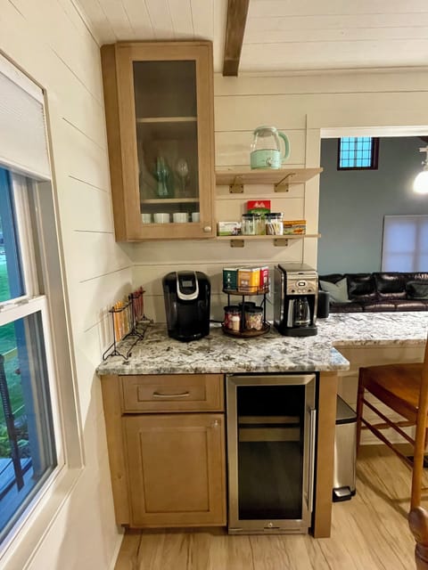 Dining room beverage station with mini fridge and coffee makers