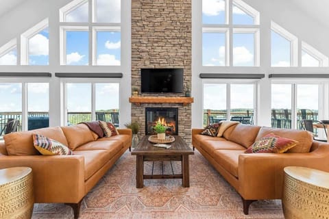 Large Family Room with floor to ceiling windows (with a great view), and cozy seating 