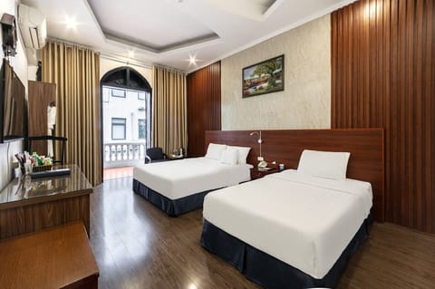 Family Room | Minibar, in-room safe, blackout drapes, iron/ironing board
