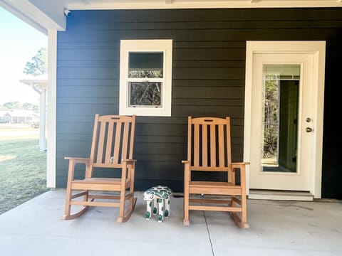 The back porch is an ideal spot to have a cold drink and soak up the atmosphere
