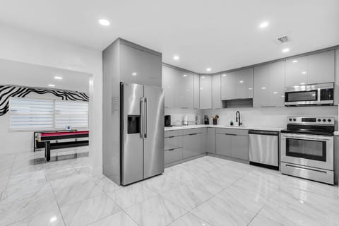 Fully remolded kitchen with stainless steel appliances