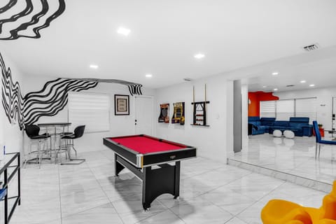 Game room with pool table, classic retro pacman and NBA game.