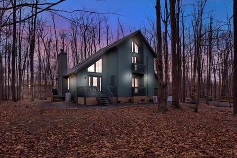 Secluded A-Frame Cabin in the Woods at Sunset