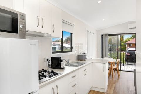 Deluxe Villa, 2 Bedrooms | Private kitchen | Coffee/tea maker, electric kettle, dining table