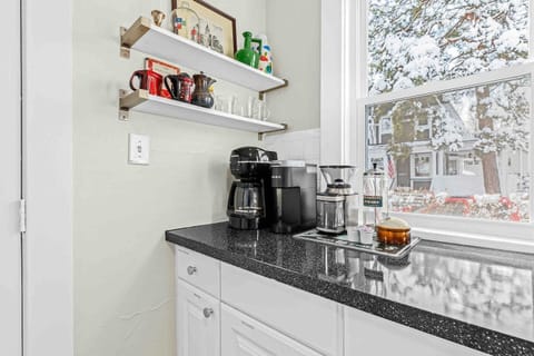 Coffee Bar located in the kitchen has coffee everyone can enjoy