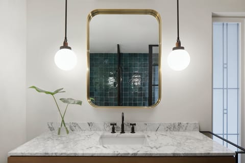 Designer toiletries, hair dryer, bathrobes, slippers