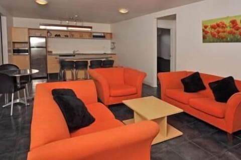 Standard Apartment, Non Smoking, Kitchen (Three Bedroom Unit) | Living area | 32-inch TV with satellite channels