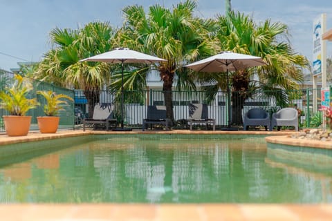 Outdoor pool, pool umbrellas, sun loungers