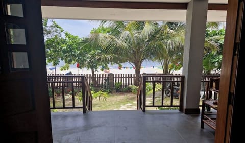 The terrace facing the beach and the sea