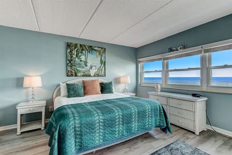Enjoy Ocean Views from Your King Bed in the Primary Bedroom