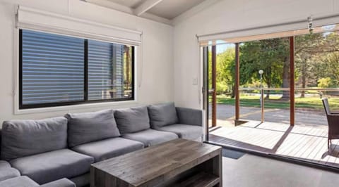 Deluxe 2 Bedroom Cabin - Sleeps 5 | Living area | LCD TV