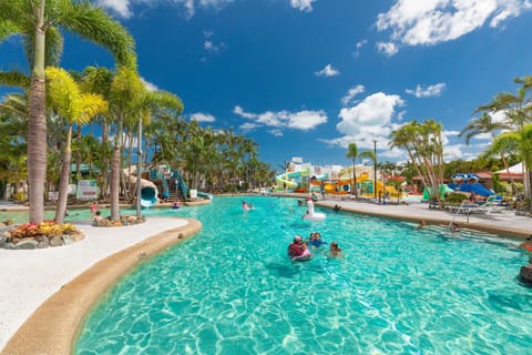 Outdoor pool, open 7:00 AM to 9:30 PM, pool umbrellas, sun loungers