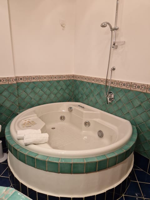 AMALFI - sea view, with Jacuzzi | Bathroom | Combined shower/tub, jetted tub, free toiletries, hair dryer
