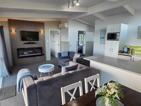 Two Bedroom with Lake View | Living area | 40-inch flat-screen TV with cable channels, TV