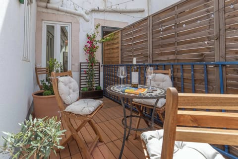 1 · Private terrace with city views and seating · StayInLisbon