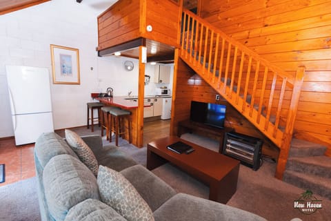 Deluxe Suite, 2 Bedrooms (Alpine Deluxe) | Living area | Flat-screen TV