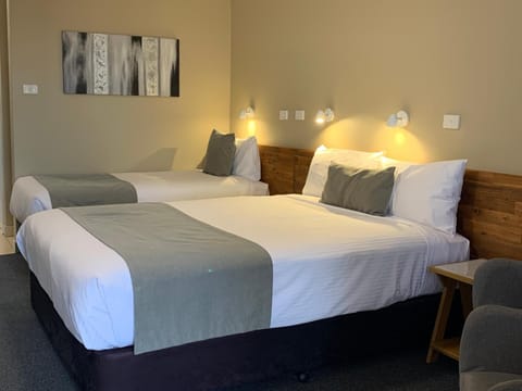 Premium bedding, down comforters, pillowtop beds, blackout drapes