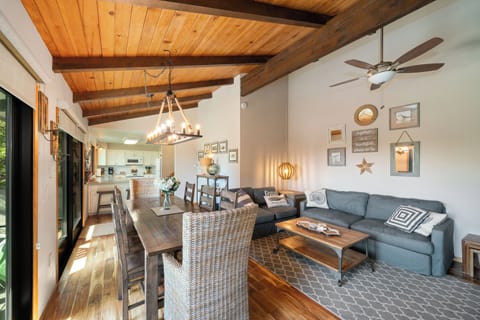 Dining/living room area with Gas fireplace/ Cable Tv DVD with access to Deck