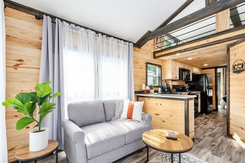 Living Room: Bright and airy space with stylish seating and rustic charm, perfect for relaxation!