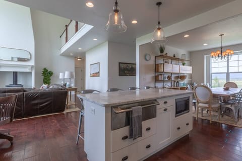 Center island features built-in extras for added convenience