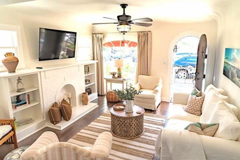 All new, this bright space features a 55" smart tv & new queen sofa bed.