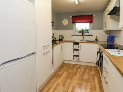 Fridge, electric kettle, toaster, cookware/dishes/utensils