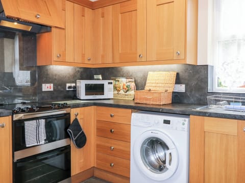 Fridge, electric kettle, toaster, cookware/dishes/utensils