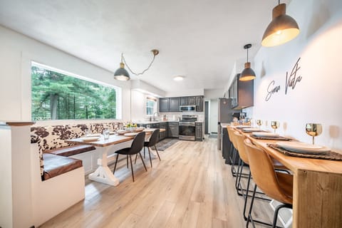 Indulge in our well-equipped kitchen, complete with a delightful coffee bar