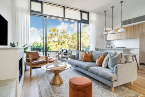 High ceilings and plenty of space. Large balcony off living w electronic louvres