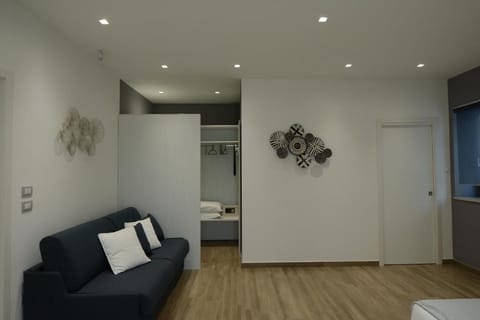 Luxury Quadruple Room, 1 Bedroom | Premium bedding, down comforters, memory foam beds, minibar