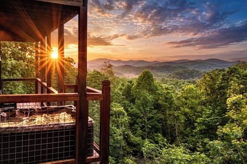 Relax on double decks overlooking the best views in the Smokies! Mt. LeConte included!! Our hot tub views after a day at the park will have you truly soaking up the moment.