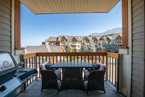 Private, second-floor balcony with mountain & pool views.