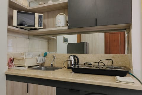 Apartment | Private kitchen | Full-size fridge, stovetop