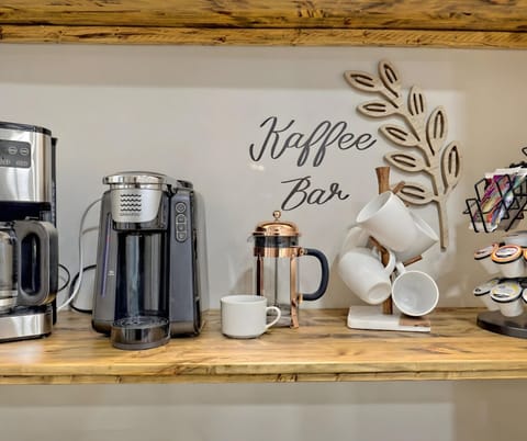Fully stocked coffee bar for easy mornings and slow starts Multiple brewing options, mugs, and essentials ready for your stay.