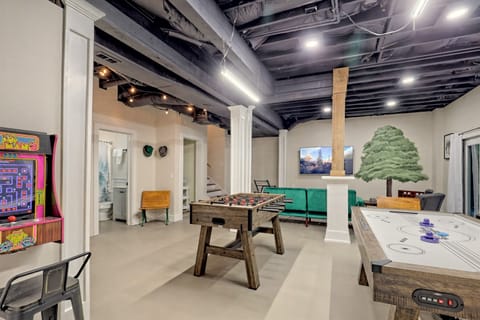 Dedicated game room for friendly competition and late-night laughs — a separate space so the fun doesn’t take over the whole house.