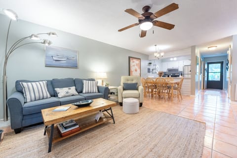 Spacious living room with comfortable seating for the entire family.