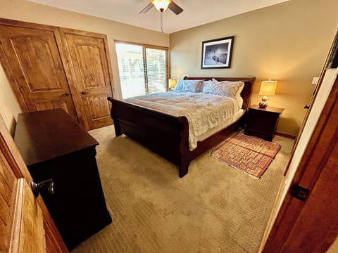 Located on bottom level, Master bedroom has King bed and private shower/toilet,