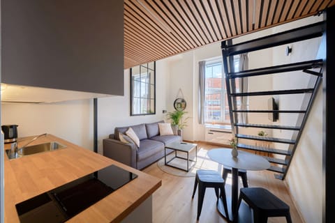 City Loft | 1 bedroom, premium bedding, laptop workspace, blackout drapes