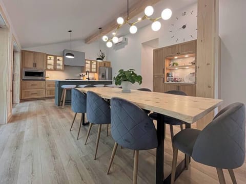 The hand crafted dining table offers comfortable seating for 8.