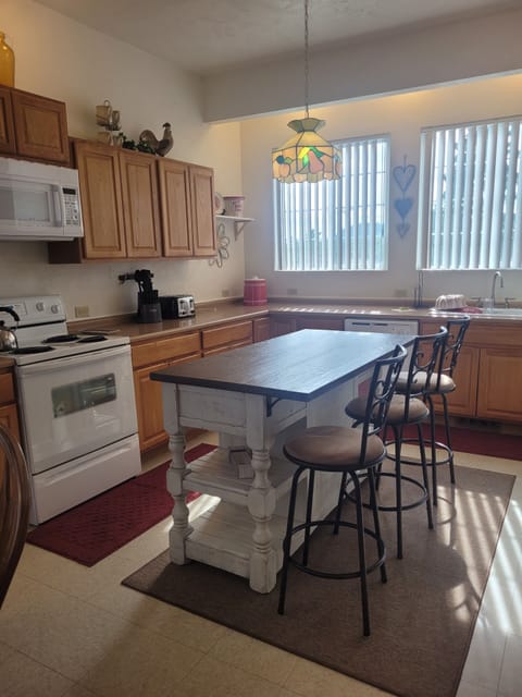 Island seating as well as large dining table