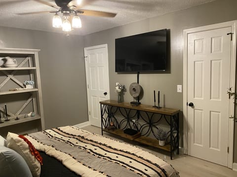 Bedroom 3: King bed, tv, closet, on suite bath 