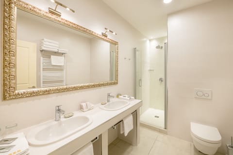 Deluxe Double or Twin Room, Balcony, City View | Bathroom | Shower, designer toiletries, hair dryer, bathrobes