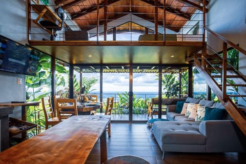 Living and Dinning Area wrapped in gardens with an amazing city view