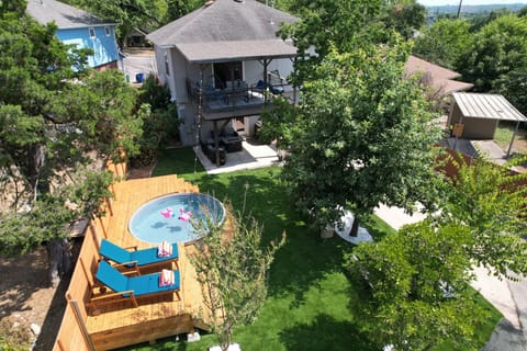 backyard - complete with deck, patio, terrace, lawn, and pickleball & corn hole