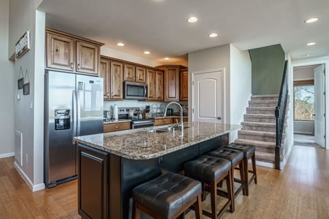 Beautiful, modern kitchen with tons of natural lighting.  Enjoy your coffee or snacks while gazing out the at the lake!