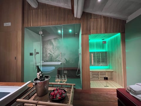 Sauna, hot tub, steam room, hot stone massages, deep-tissue massages