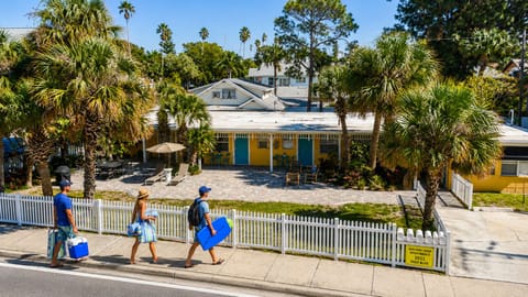 Welcome to your tropical getaway! This charming beach house offers a private entrance, lush landscaping, and a relaxing atmosphere just moments from the shoreline.
